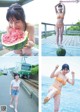 A woman in a bikini eating a watermelon.