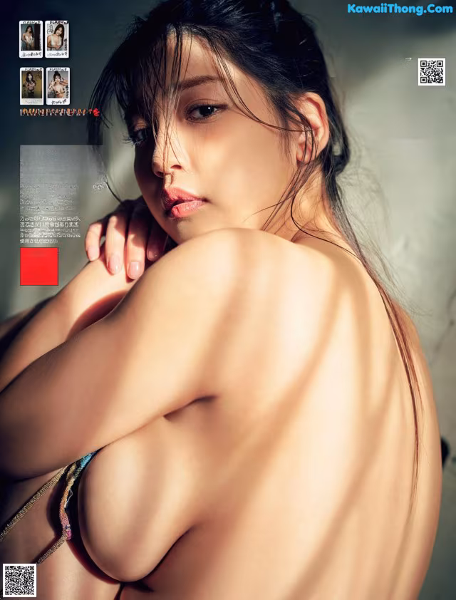 A naked asian woman in a bikini posing for a magazine.