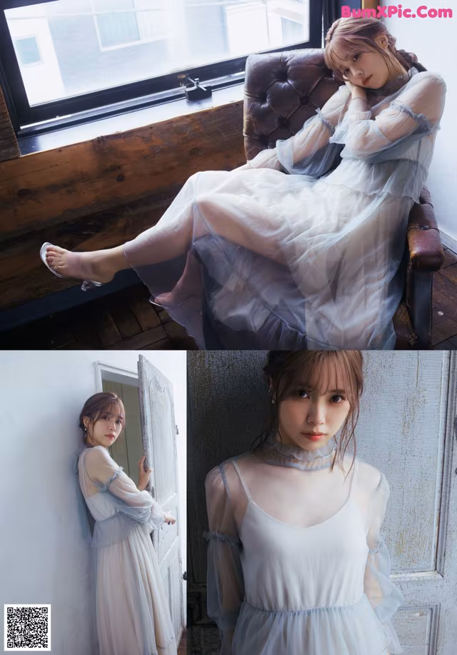 A woman in a white dress sitting on a chair.